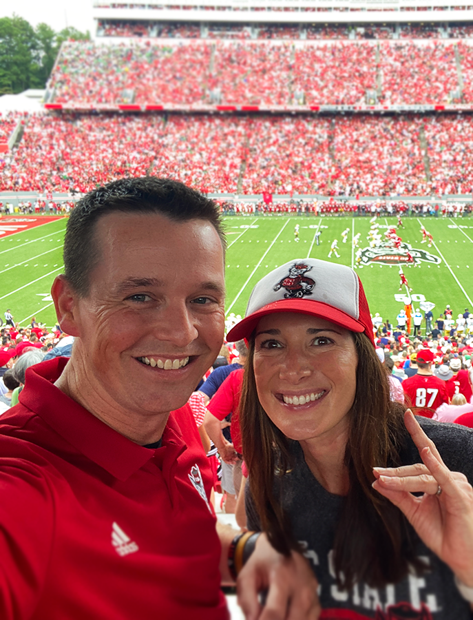 Matt and Brooke Kelley at a football game