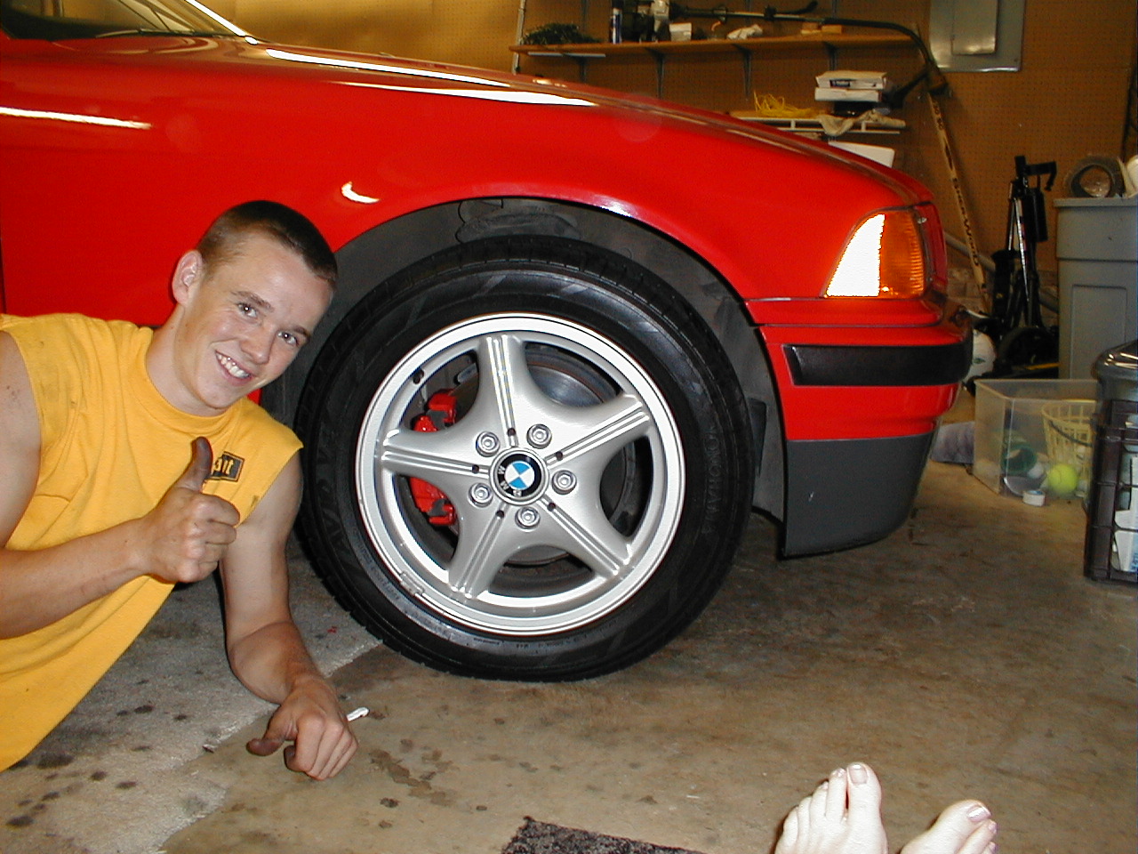 Matt in high school with a BMW from the family dealership lot